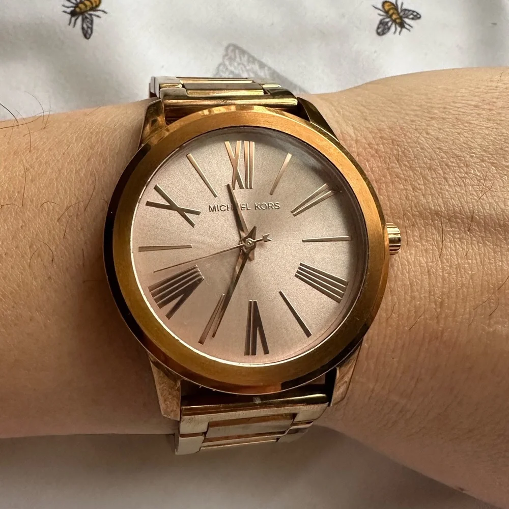 Excellent condition Michael kors three taryn hand rose gold watch Roman numbers